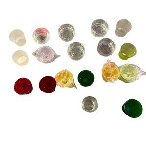 Few candles and many candle holder in glass